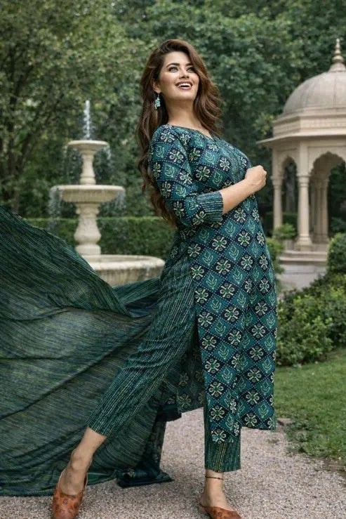 Back view of a green printed kurti and matching pants